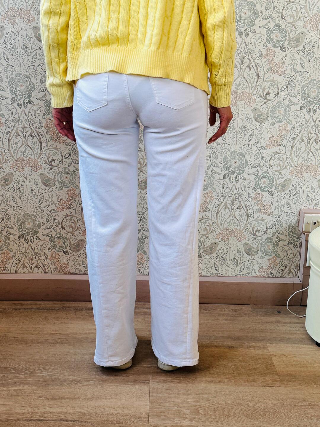 Jeans a zampa bianchi da donna, vita regular.