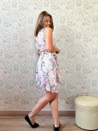 Abito Rose: Abito a fantasia floreale con scollo a V ed elastico in vita