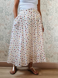 Gonna midi a pois colorati con sottogonna. Elastico in vita. 