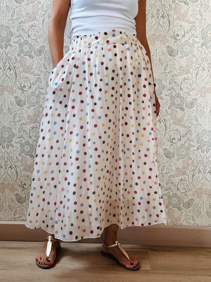 Gonna midi a pois colorati con sottogonna. Elastico in vita. 