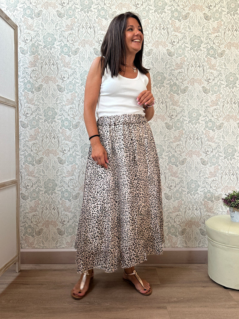 Gonna bianca midi con stampa animalier. Elastico in vita.