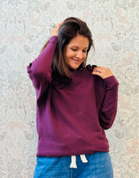 Maglione Volant